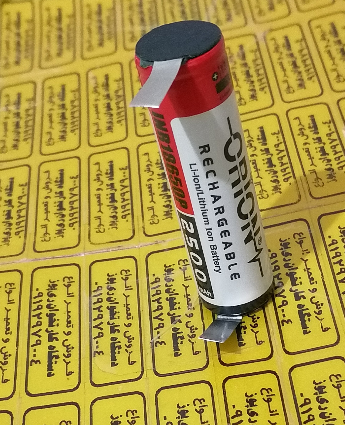 باتری لیتیوم یون 18650 ORION باظرفیت 2500mAhآکبند دو سر پلیپ شده